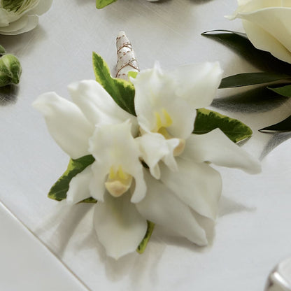 White Mini Cymbidium Boutonniere – MELINDA MCCOY'S FLOWERS, Long Beach CA